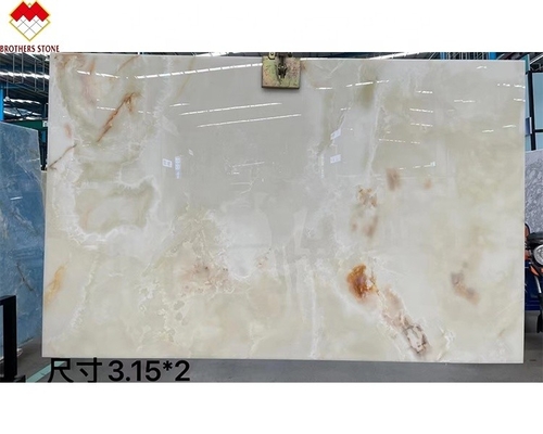 สีขาวโปร่ง Onyx มาร์บอร์ ใหญ่ Slab Backlit สีแดง/ทอง เส้นเลือดสําหรับตกแต่งโรงแรม