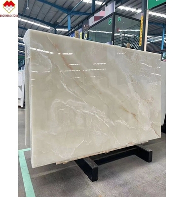 แผ่นมาร์บอร์มออนิกซ์สีขาวแบบ Royal White Onyx ที่มีแสงเบื้องหลังสําหรับโต๊ะที่สามารถปรับแต่งได้