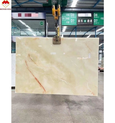 แผ่นมาร์บอร์มออนิกซ์สีขาวแบบ Royal White Onyx ที่มีแสงเบื้องหลังสําหรับโต๊ะที่สามารถปรับแต่งได้